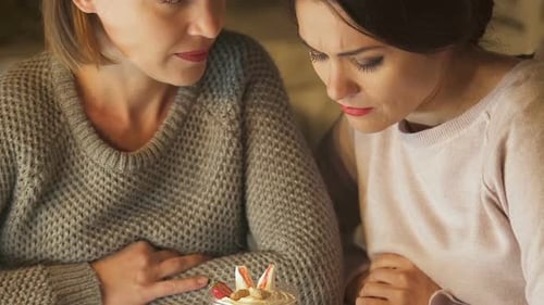 Two Women Having a Difficult Conversation Indoors