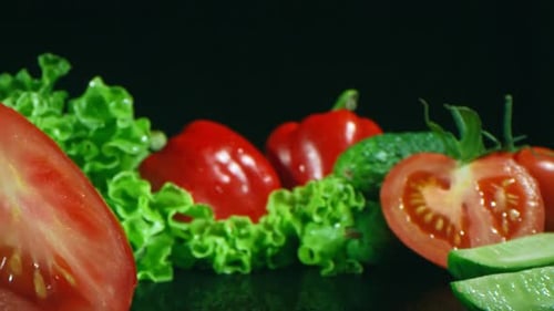 Fresh Vegetables Display: Tomatoes, Peppers, Lettuce, Cucumber