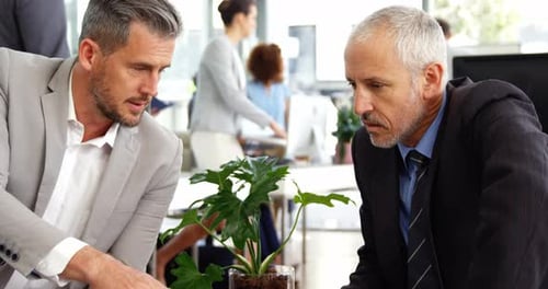 Business people shaking hands in office