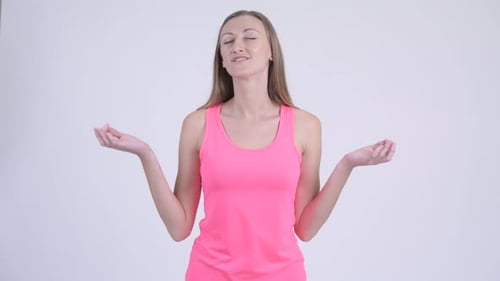Woman Practicing Yoga Poses Indoors