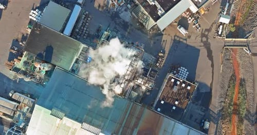 Aerial view industry chemical production building with tanks for the storage