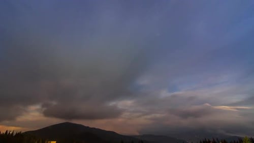 Starry Night Sky Time-Lapse over Mountains