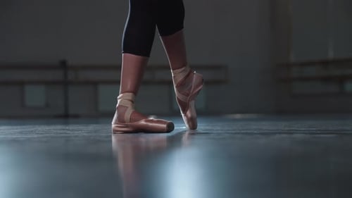 Ballet Dancer Practicing Pointe in Dance Studio