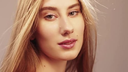 Close-up of Beautiful Woman with Long Flowing Hair
