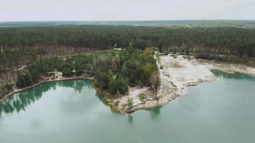 Aerial View of Lake Pine Forest on the Background