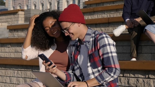 Students Using Technology on Urban Steps