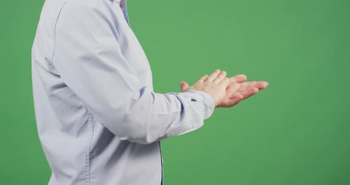 Side view of palms rubbing