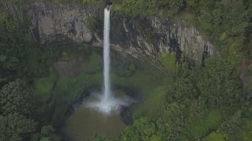 Breathtaking Aerial View of Tropical Waterfall in Nature