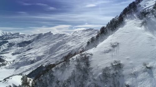 Snowy Mountain Range Aerial on a Sunny Day