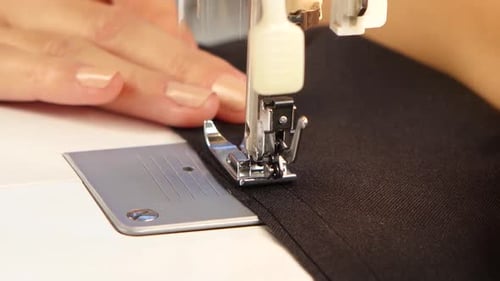 Sew the Fabric on the Sewing Machine. Close Up