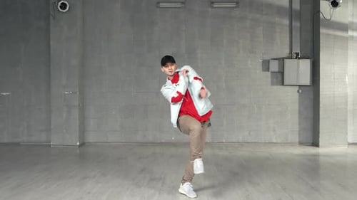 Attractive Guy Dancing Hiphop on City Street