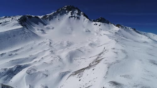 Snowy Mountain Peaks Aerial Landscape in Winter