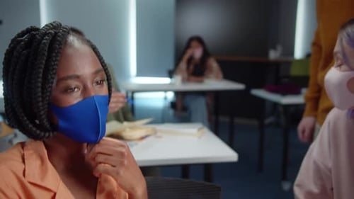 Students in Classroom Receive Guidance From Teacher