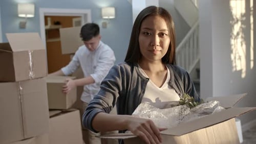 Young Couple Moving into New Home