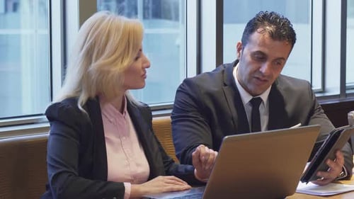 Business Professionals Meeting Together in Bright Office