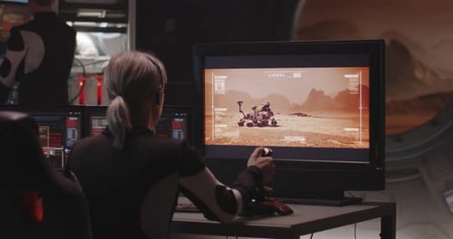 Woman Drives Rover From Futuristic Mission Control