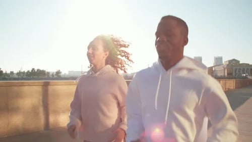 Jogging Together On Sunny Morning