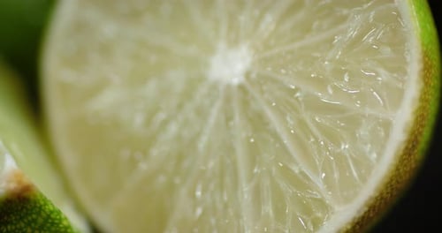 Pieces of Fresh Lime Slowly Rotating