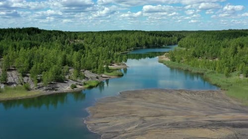 Flying above the lake in the abandoned clay quarry