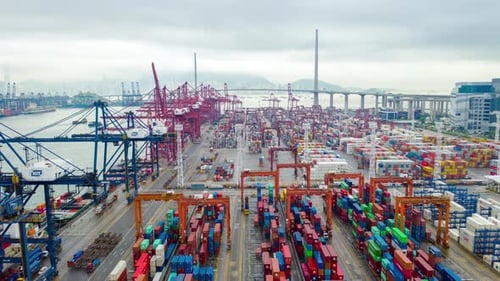 Busy Shipping Port with Colorful Containers Aerial View