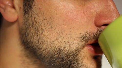 Drinking a Cup Close Up