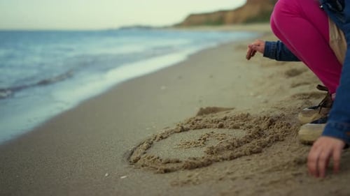 Kid Hands Drawing Sand Beach at Sea Vacation