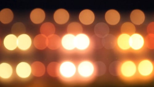 Fond bokeh de lumières de parc d'attractions