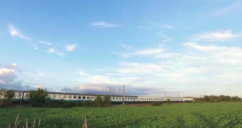 White Train Over the Meadow in the Countryside