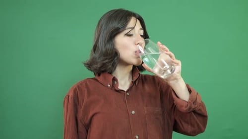 Woman Drinking Water From Glass