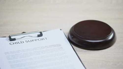 Child Support Document Table, Gavel Striking on Sound Block, Family Law, Court