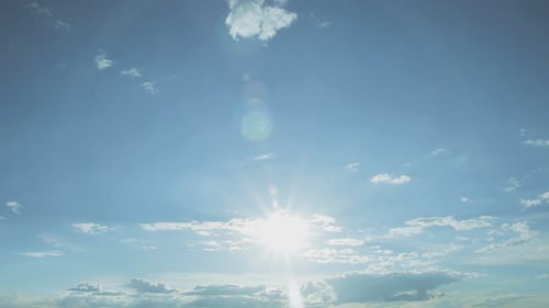Beautiful Cloudscape with Bright Sun and Blue Sky