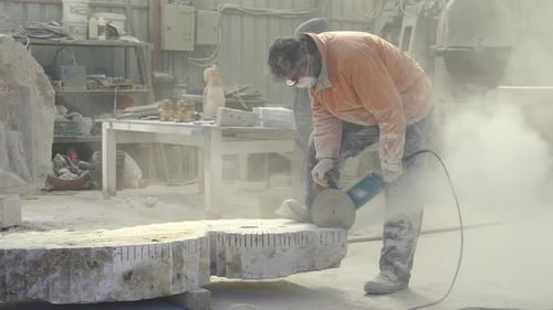 Sculptor Carving Stone 9