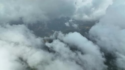 Cloudy landscape high in the mountains aerial view 4 K