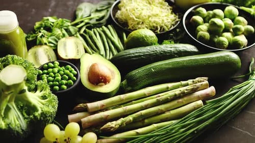 Green Healthy Food Composition with Avocado, Broccoli, Apple, Smoothie...