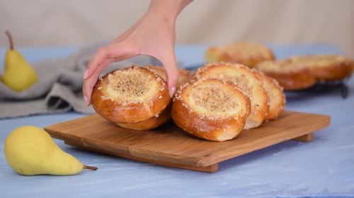Delicious Buns with Pear on Board