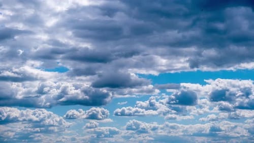 Dramatic Clouds Drifting Across a Blue Sky