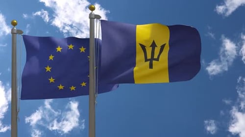 European Union and Barbados Flags Waving in Wind