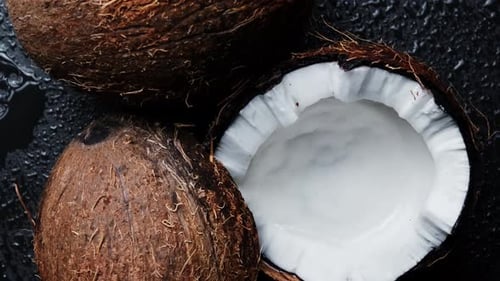 Split Into Two Halves Coconut on a Black Background