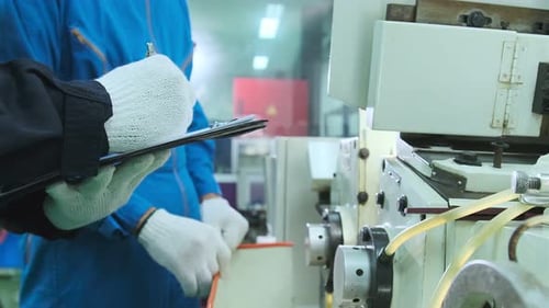 Professional engineering walking discuss inspecting with engineer team machinery factory area