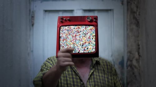 Man with Retro Television Set for Head