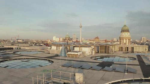 AERIAL: Confident Young Man Standing on Rooftop Over Berlin Central, Mitte on Beautiful Sunny Day