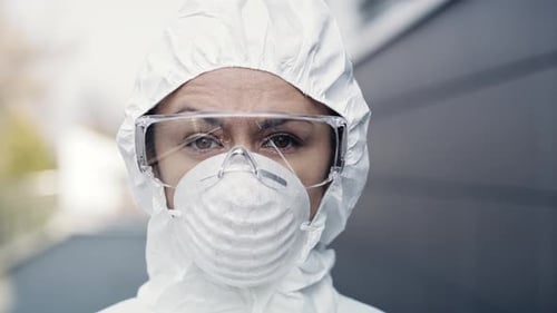 Person Wearing Protective Gear, Mask and Safety Glasses