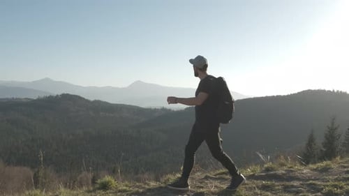 Hiking - Hiker Man on Trek with Backpack Living Healthy Active Lifestyle. Hike in Mountain Nature