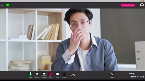 Man on Video Call in Home Office Setting
