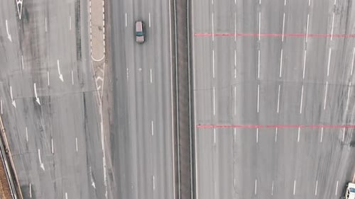 Cars Drive Under Payment Point Gateway on Road with Barriers