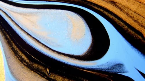 Abstract Swirling Paint in Blue, Gold, and Black