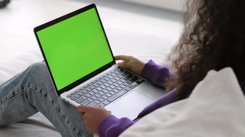 Black Woman Using Laptop Notebook Viewing Green Screen Press Keyboard Browsing Chroma Key