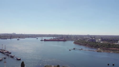 Aerial drone view of Black Sea Port with metals containers, high cranes and ships