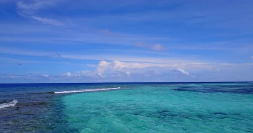 Natural drone abstract view of a sandy white paradise beach and aqua blue water background