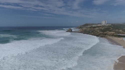 Aerial View of Huge Waves Breaking As They Roll to Sea Shore